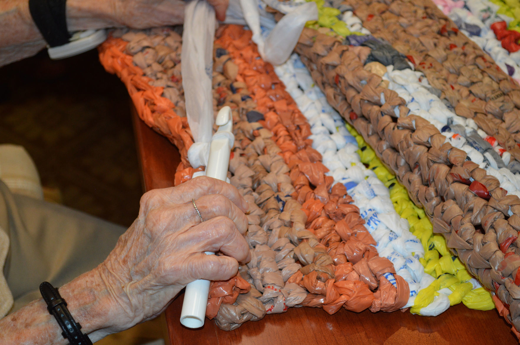 Homeless benefit from seniors' project to upcycle grocery bags